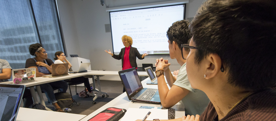 Screenwriting class in session with professor and students